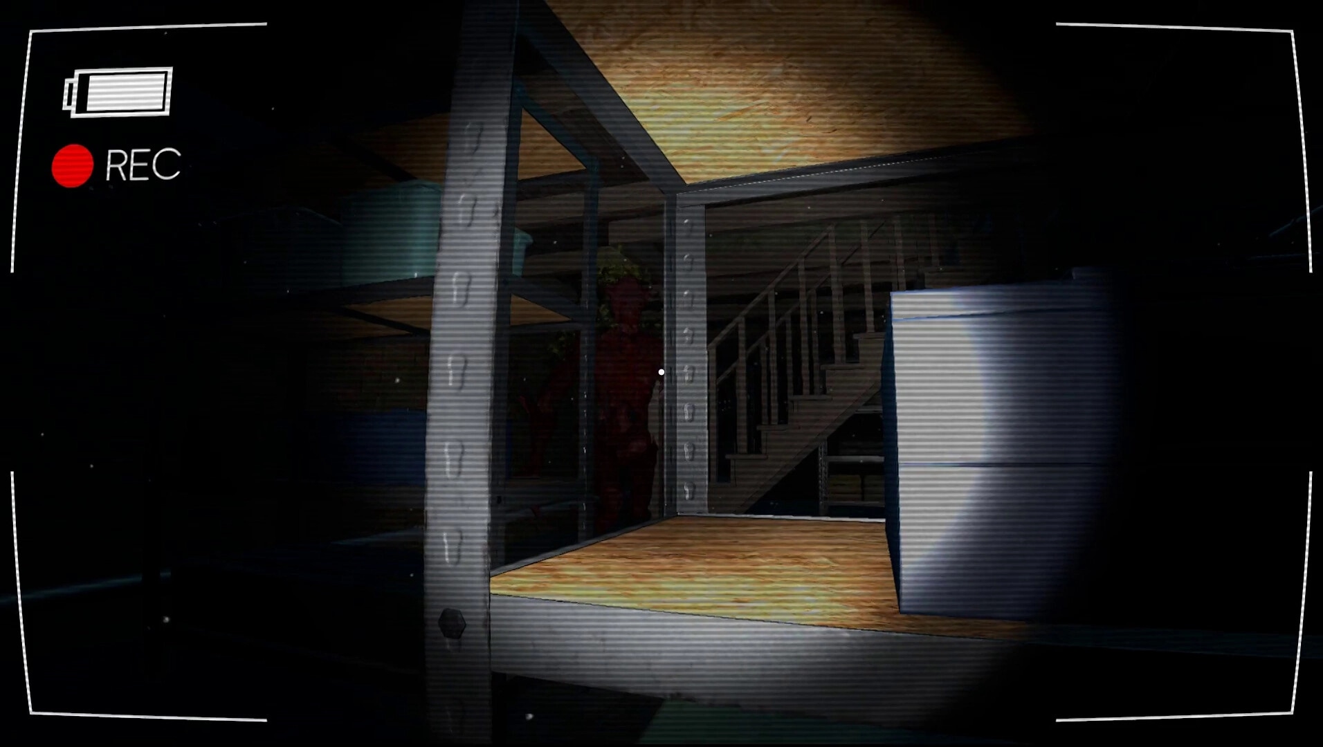 Vicious Cycle: Exploring dark room with flashlight revealing staircase and metal shelves, camera recording.