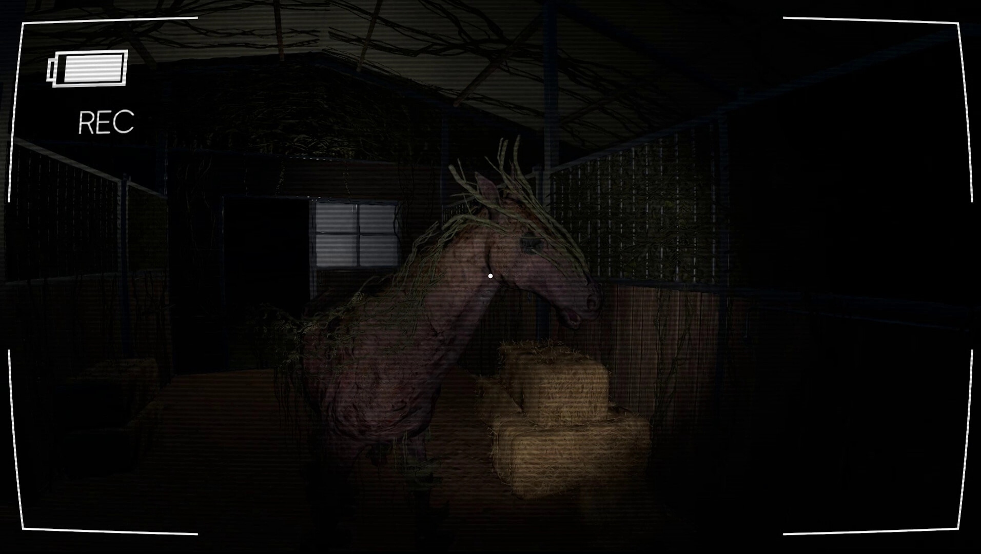 Vicious Cycle: Supernatural creature in dark stable with hay bales, viewed through recording interface
