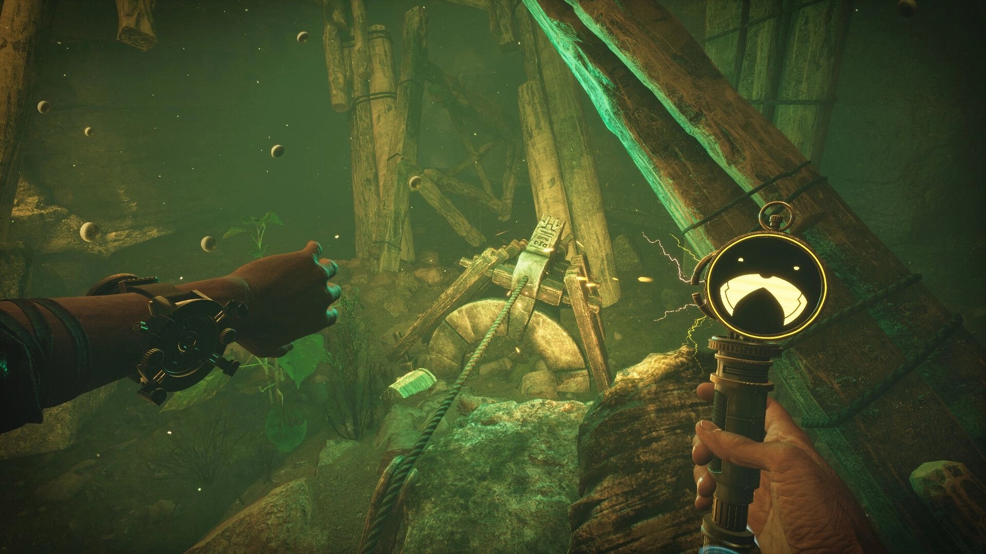 Wanderer: Player examining ancient mechanism with compass in underground cavern filled with green mist
