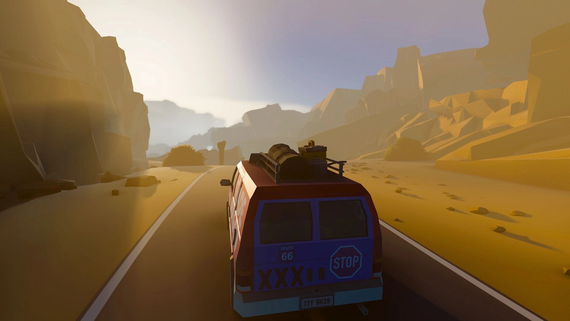Wanderer Wheels: Van driving down a desert highway between rocky canyons at golden sunset light.