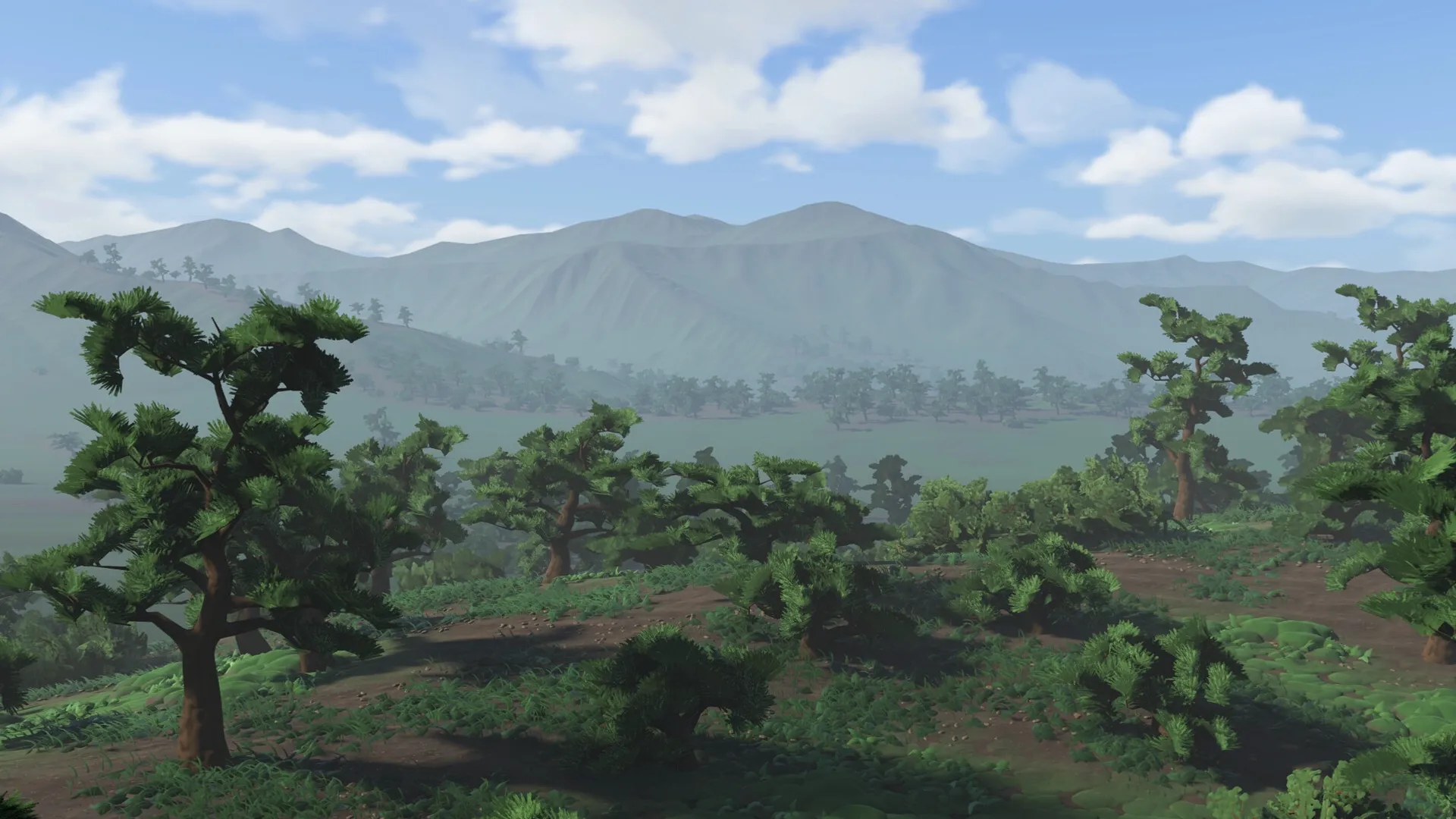 Warlord: Verdant landscape with dense forest and distant mountains under a clear blue sky