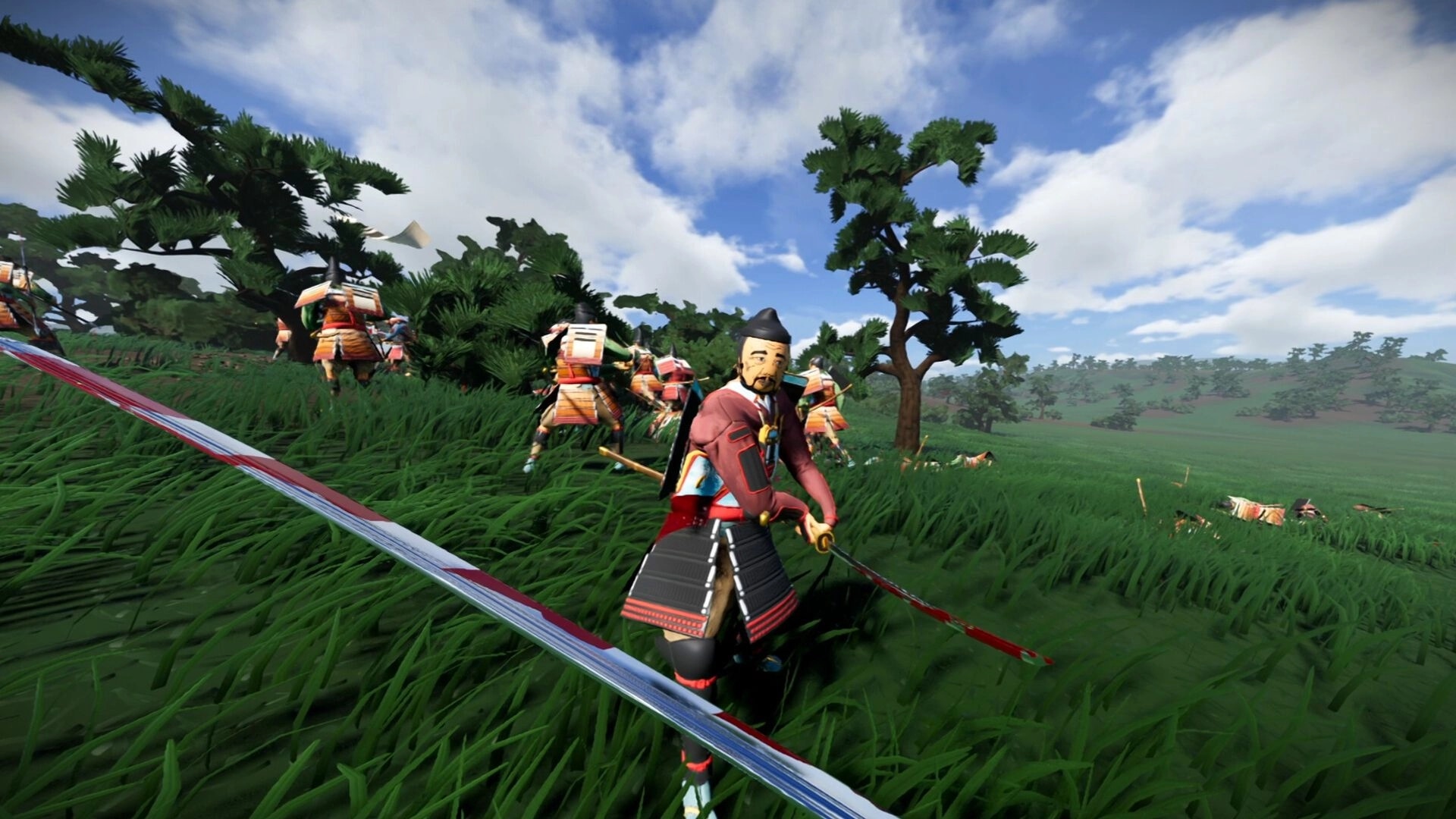 Warlord: Samurai warrior with katana leads charge through grassy battlefield on Awaji Island