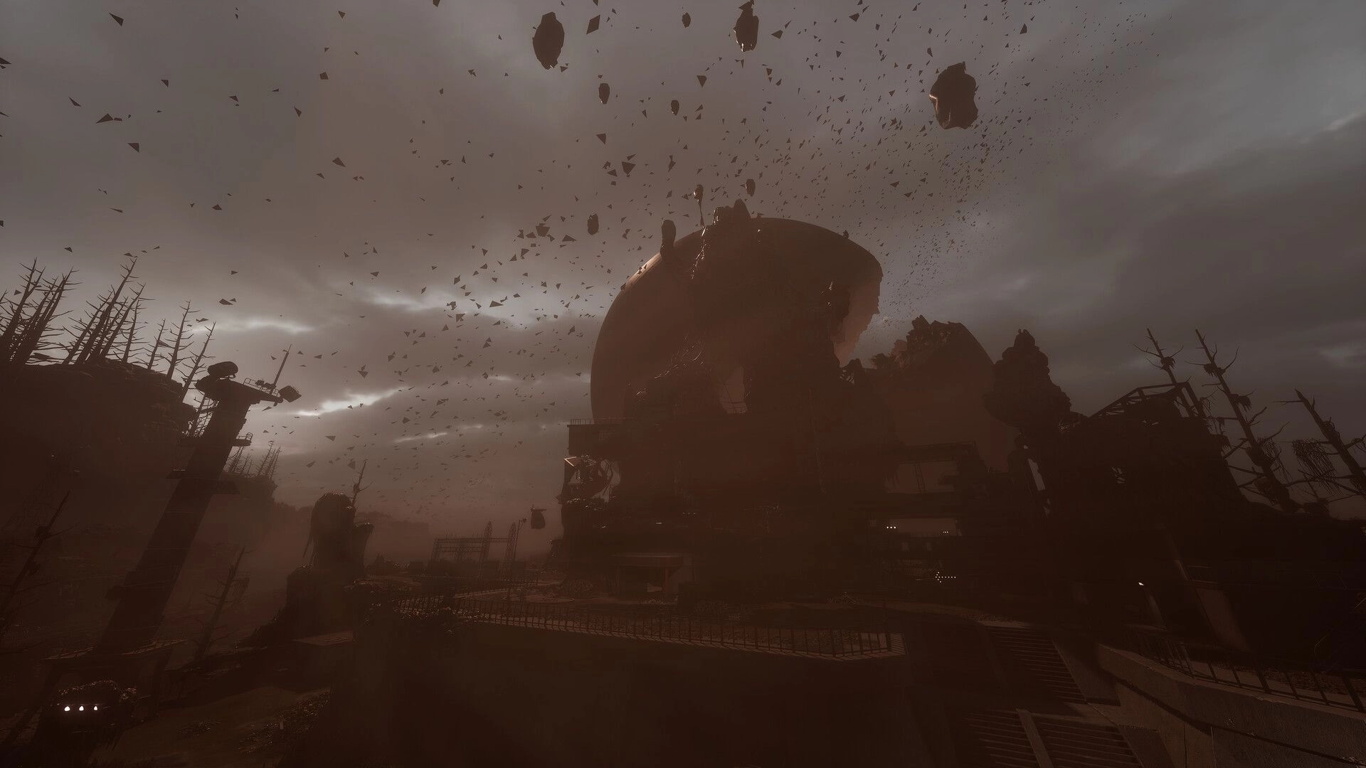 Waste The Fallen: Debris swirls around a ruined industrial dome under storm clouds in a dead wasteland.