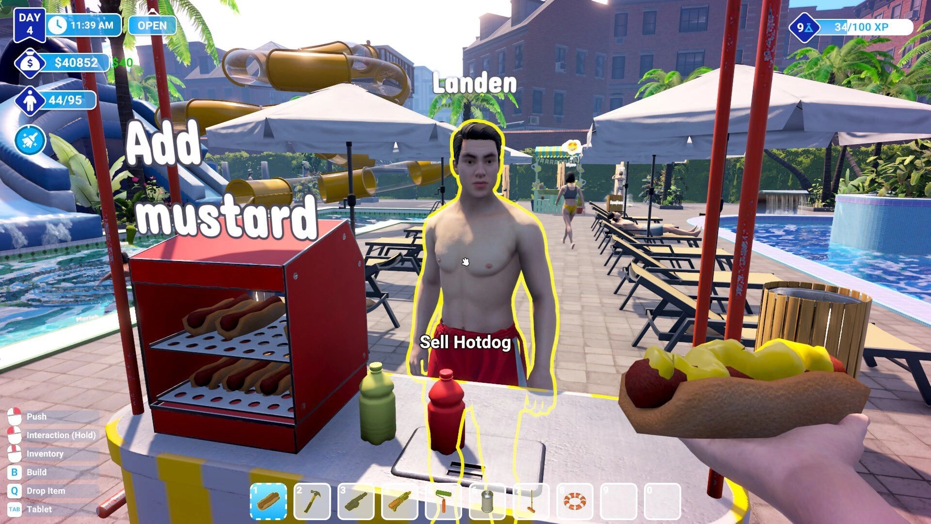 Waterpark Simulator: Landen sells hotdogs at poolside stand with mustard, slides, and lounge chairs nearby