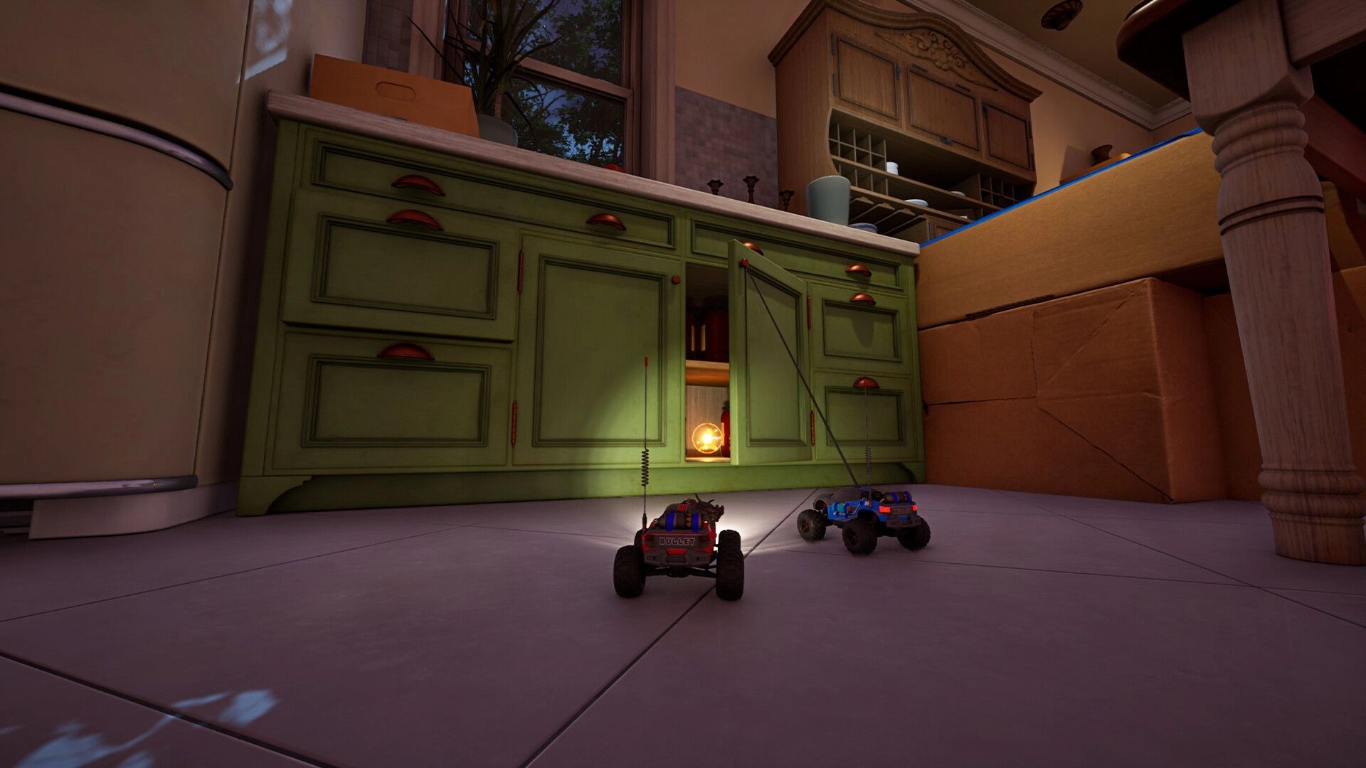 WheelMates: Two RC cars explore a kitchen floor with open cabinet under warm lighting.