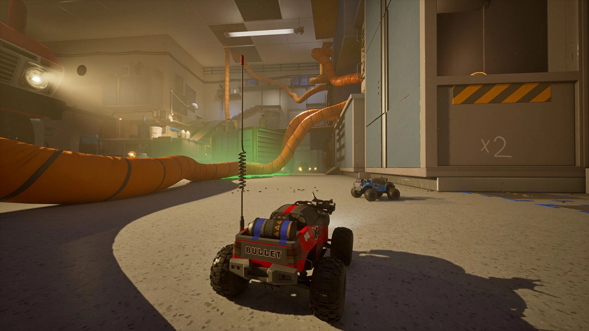 WheelMates: Two RC cars navigate a cluttered laboratory with orange tubes and ambient lighting