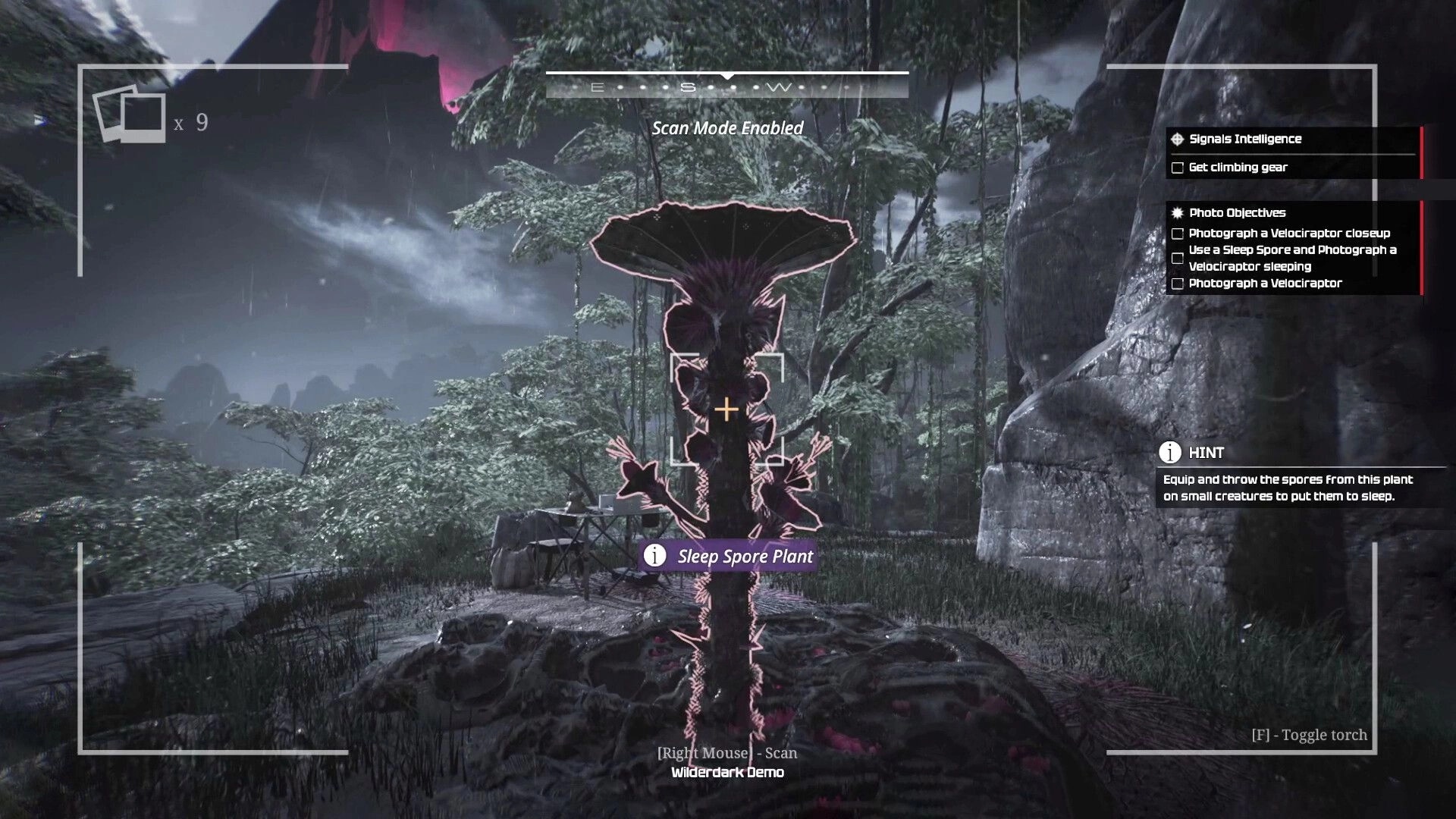 Wilderdark: Scan mode highlights a Sleep Spore Plant in misty jungle clearing with objectives UI.
