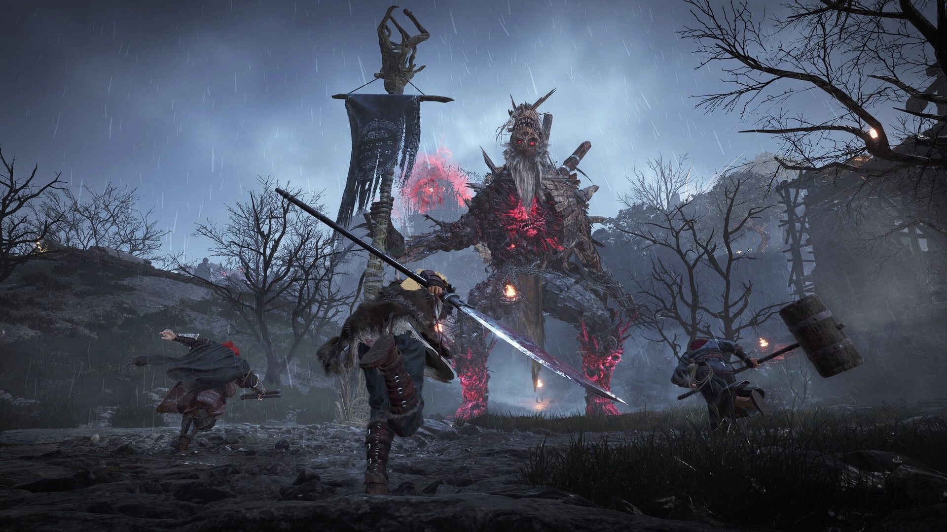 Wo Long 2: Three warriors charge a towering demon boss in a rainy, barren battlefield with banner flag.