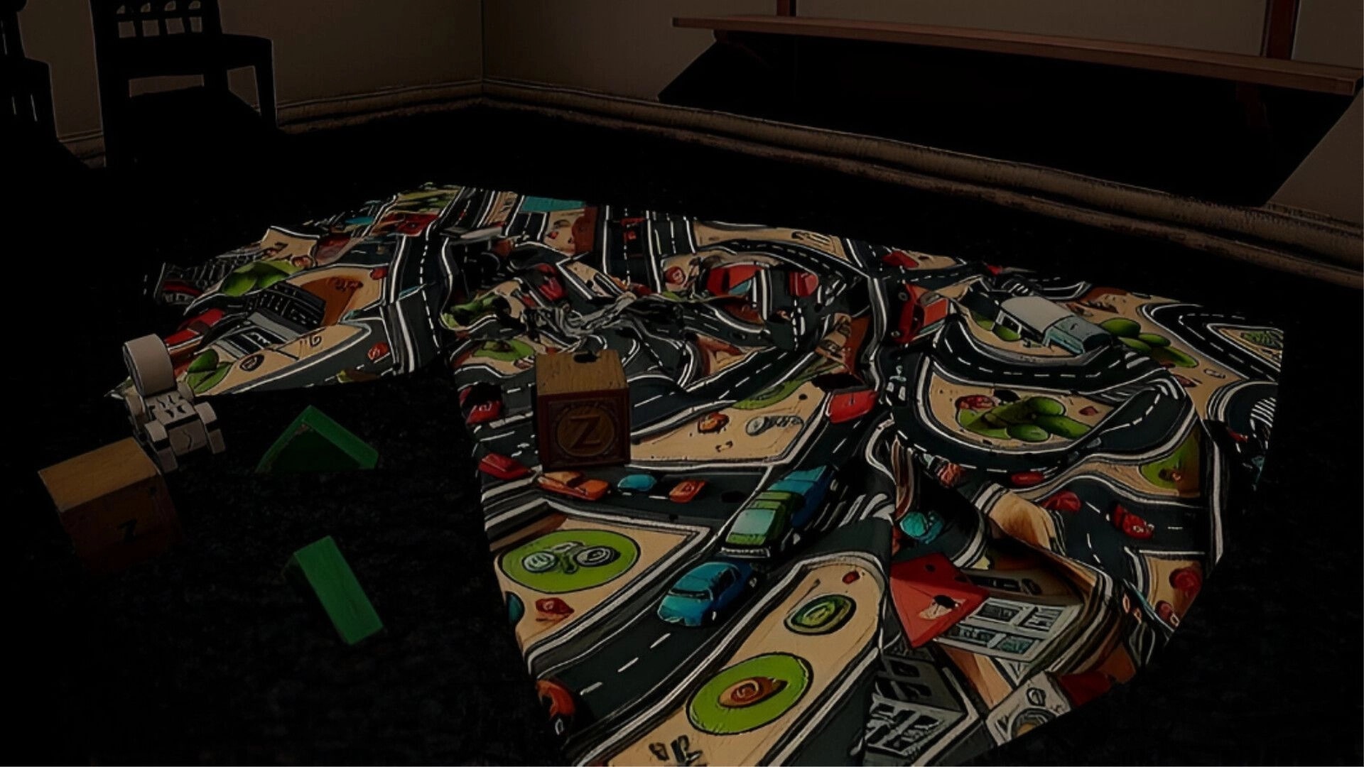 Wonderland: Crumpled play mat with toy blocks scattered in a dark, eerie room environment