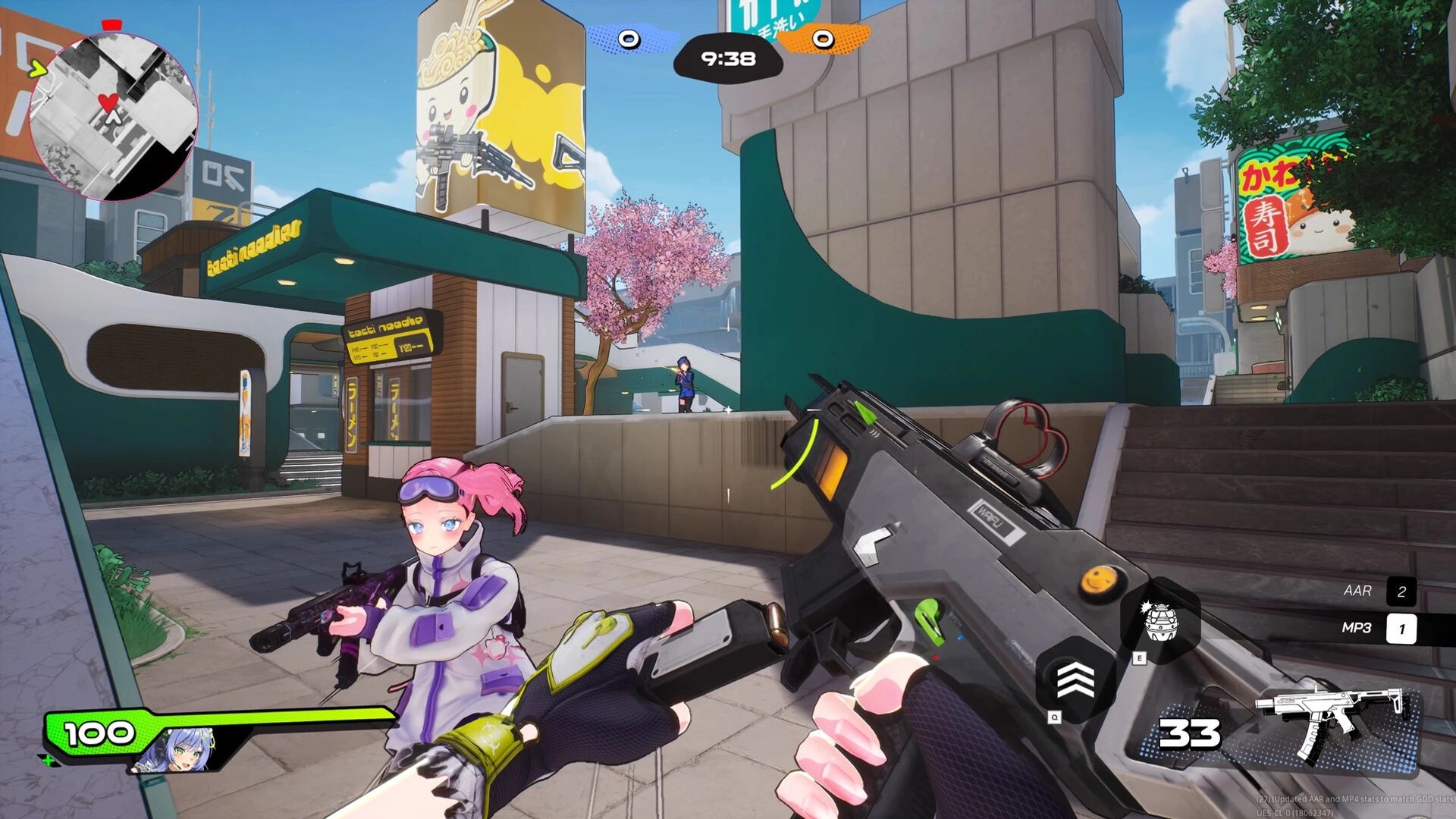 WTF: Player reloads weapon in urban area with cherry blossoms; anime character teammate visible nearby.