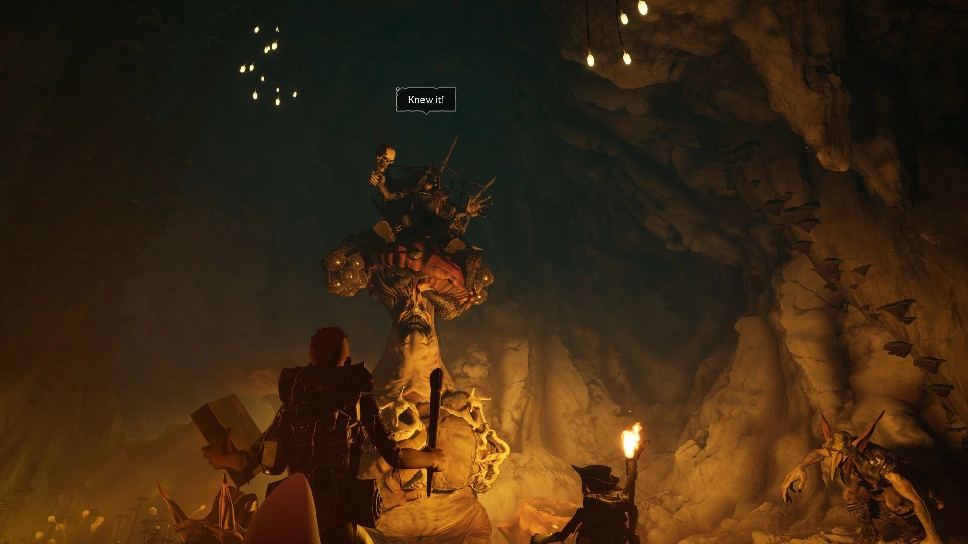 Wyldheart: Party faces a towering ogre in a torchlit cave, dialogue bubble reads "Knew it!".