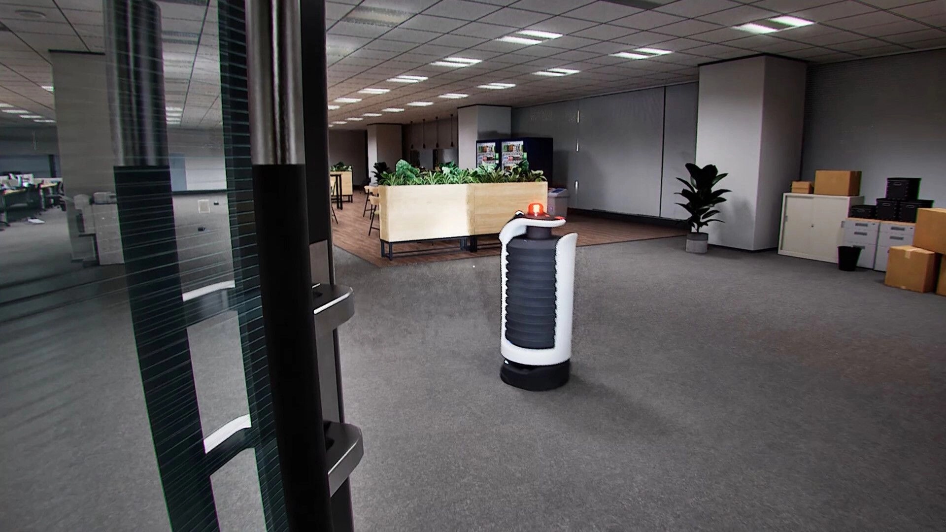 Zangyou: First-person view facing a patrol robot with red light in a quiet office break area.