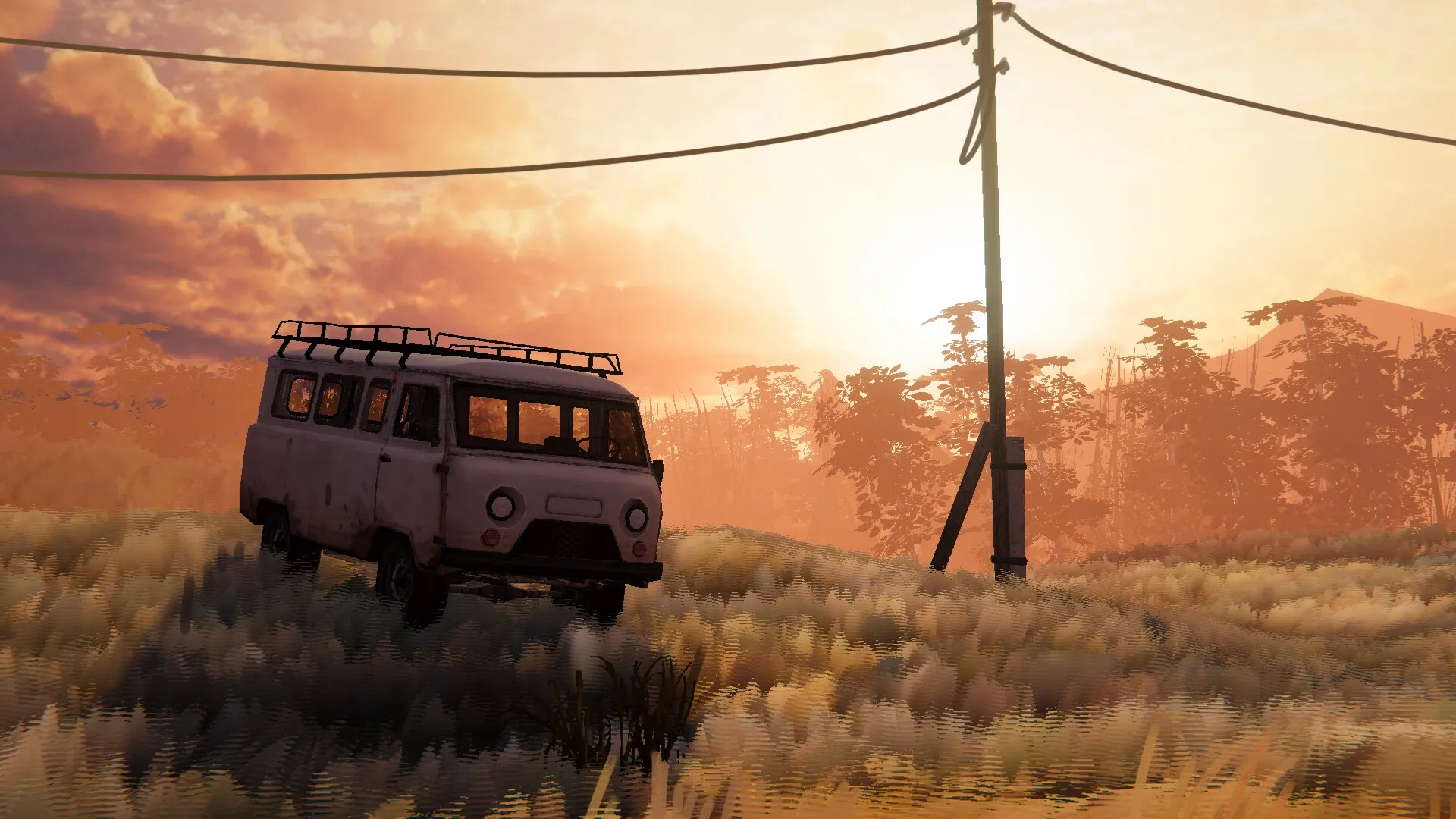 Zarya: Rusty van parked on grassy hill at sunset, with power lines and trees in rural landscape.