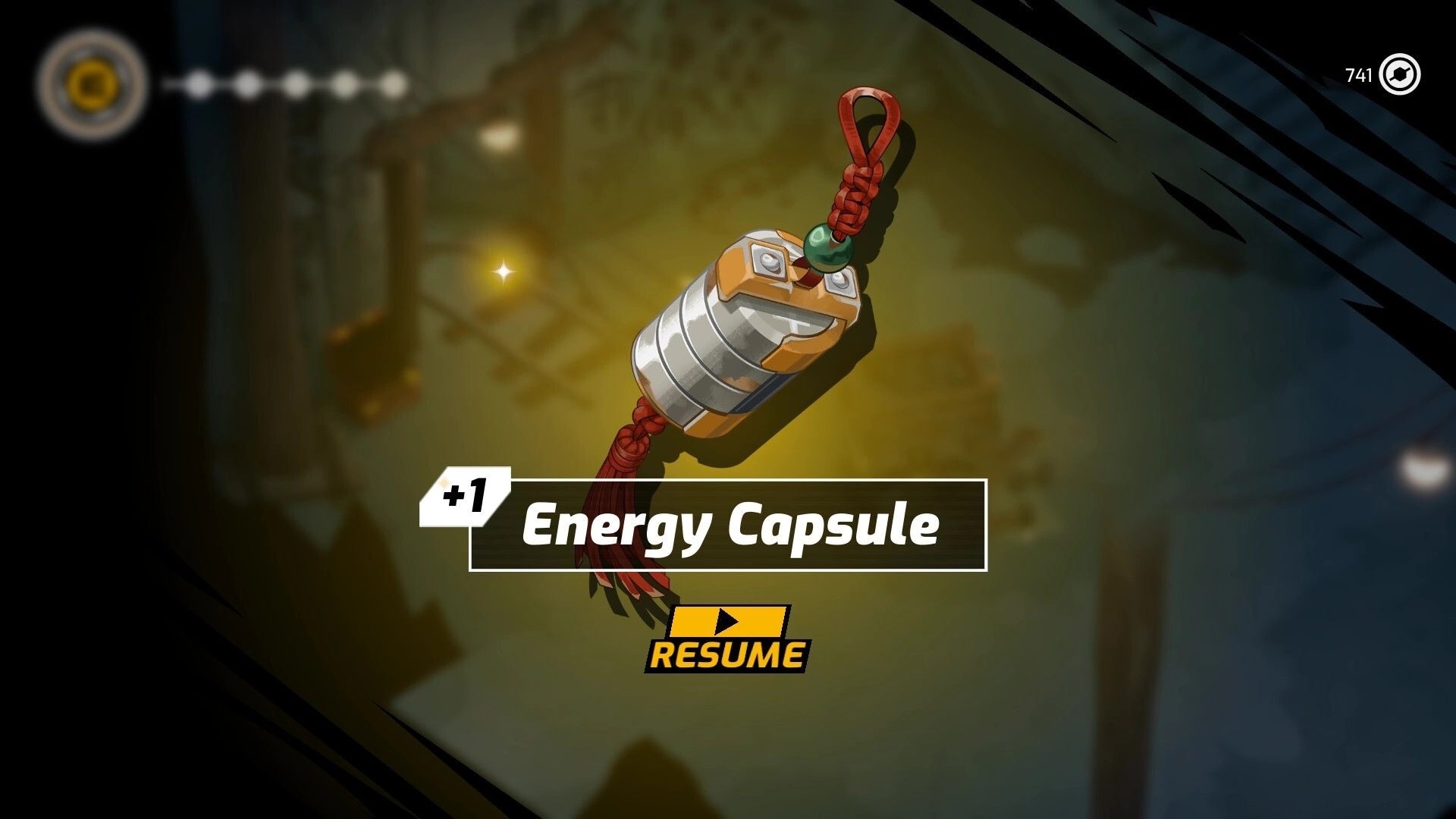 ZHEN: +1 Energy Capsule pickup popup with Resume button over a blurred rocky cave background.