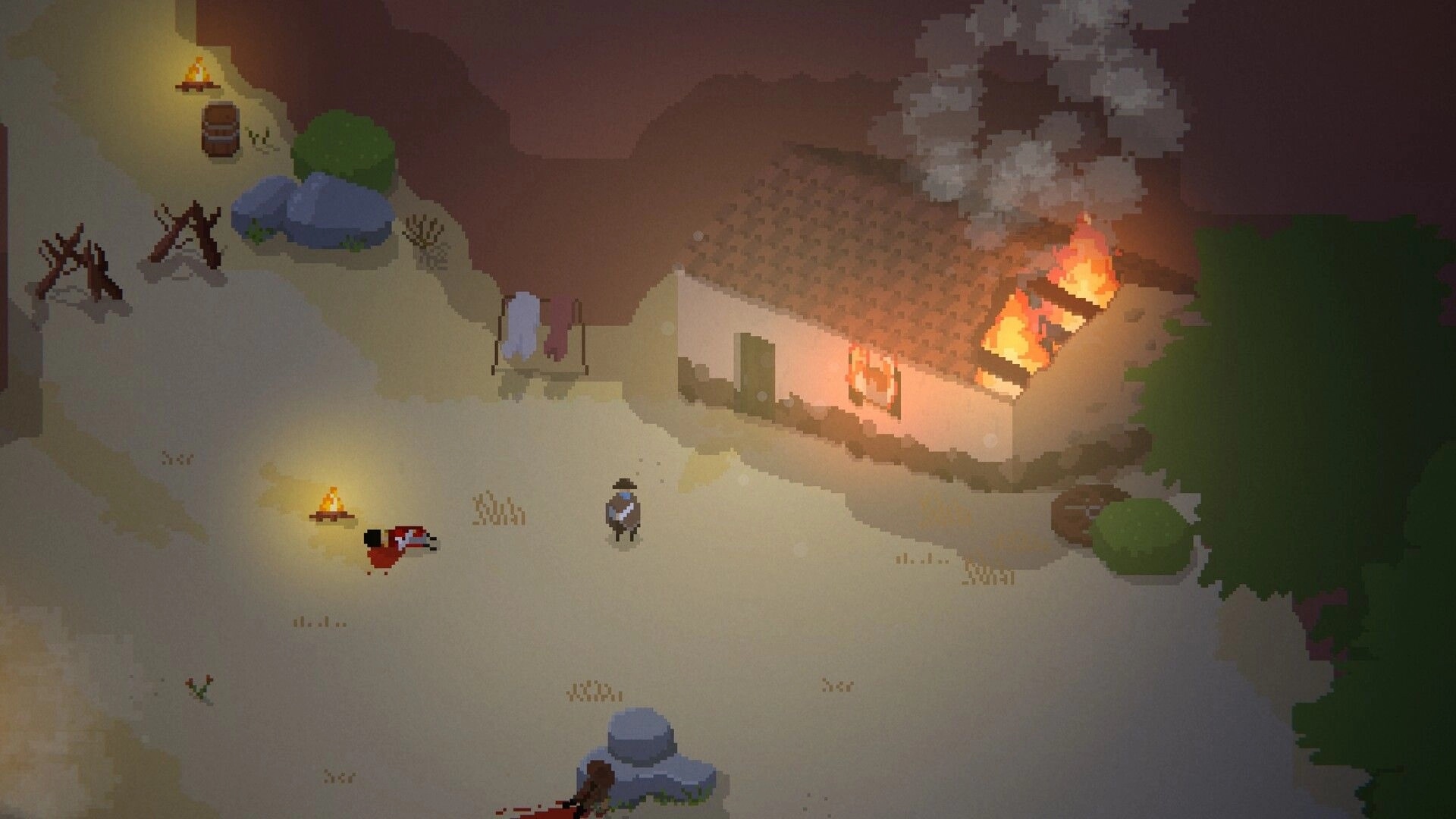 Zupay: Top-down view of a burning hut with smoke and campfires on a sandy hillside path.